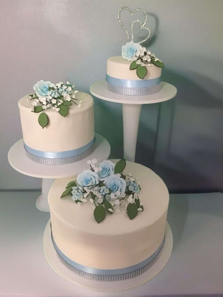 Elegant Three-Tier Floral Wedding Cake - Image 2