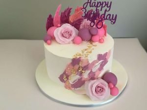 A Birthday Symphony in Pink and Gold Cake
